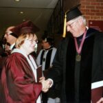 Greeting former Augsburg President Bill Frame at his inauguration in 1997